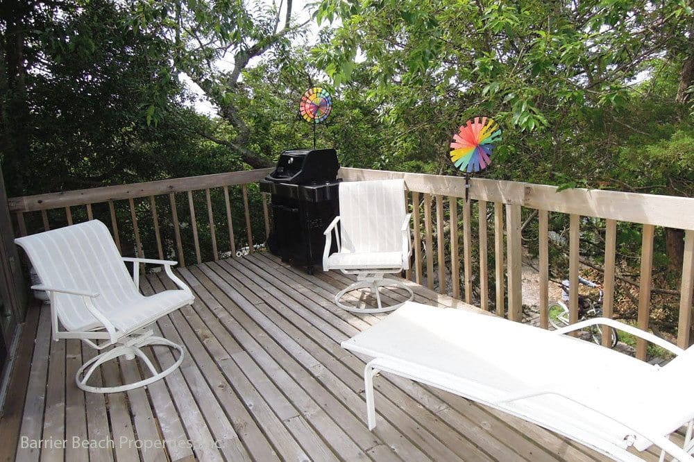 Enjoying Fair Harbor Rental in Fair Harbor Barrier Beach Properties